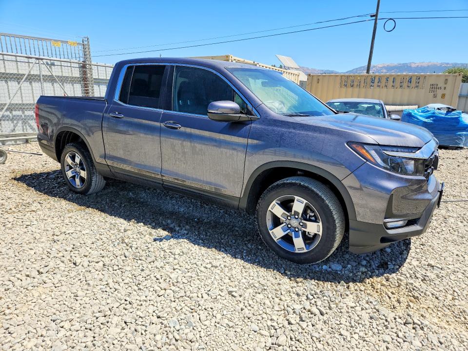 Photo 4 from auction – 2026 HONDA RIDGELINE with VIN 5FPYK3F56TB022857