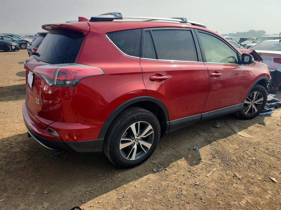 Photo 3 from auction – 2016 TOYOTA RAV4 with VIN JTMRFREV9GJ086136