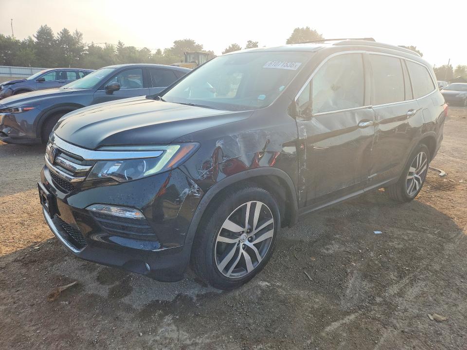 HONDA PILOT 2016 with VIN 5FNYF6H02GB041671 - Photo from auction