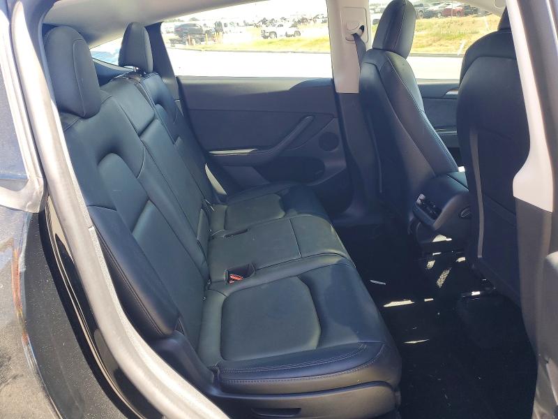 Photo 11 from auction – 2022 TESLA MODEL Y with VIN 7SAYGAEE7NF555550