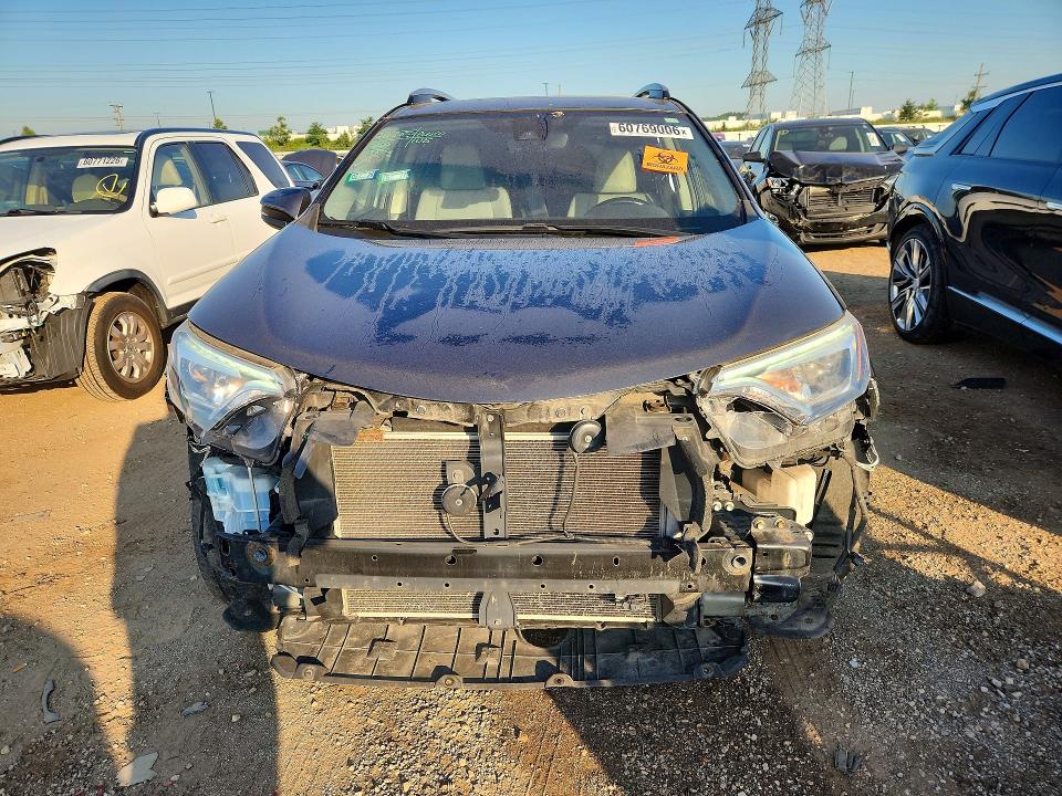 Photo 5 from auction – 2018 TOYOTA RAV4 with VIN JTMDFREV9JD253899