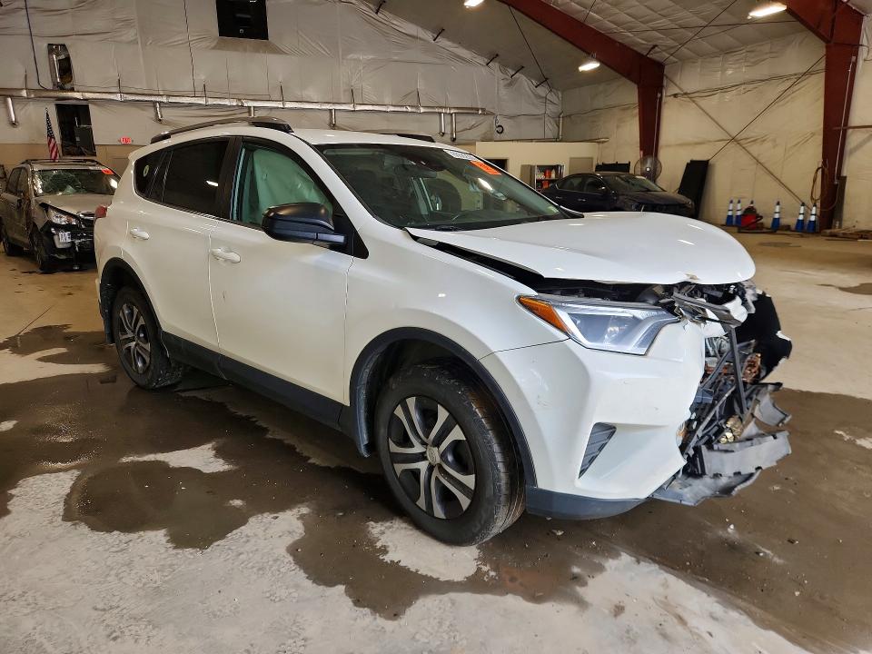 Photo 4 from auction – 2018 TOYOTA RAV4 with VIN 2T3BFREV6JW747079