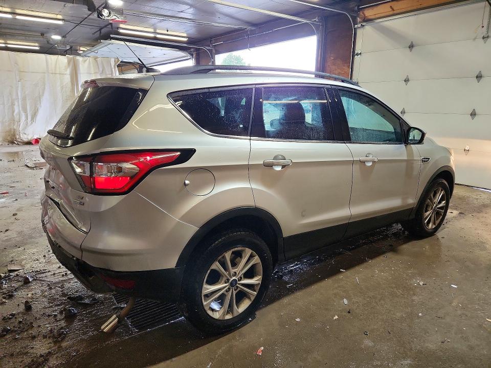 Photo 3 from auction – 2017 FORD ESCAPE with VIN 1FMCU9GD4HUD02230