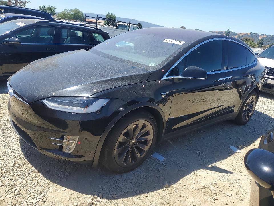 TESLA MODEL X 2018 with VIN 5YJXCAE29JF142761 - Photo from auction