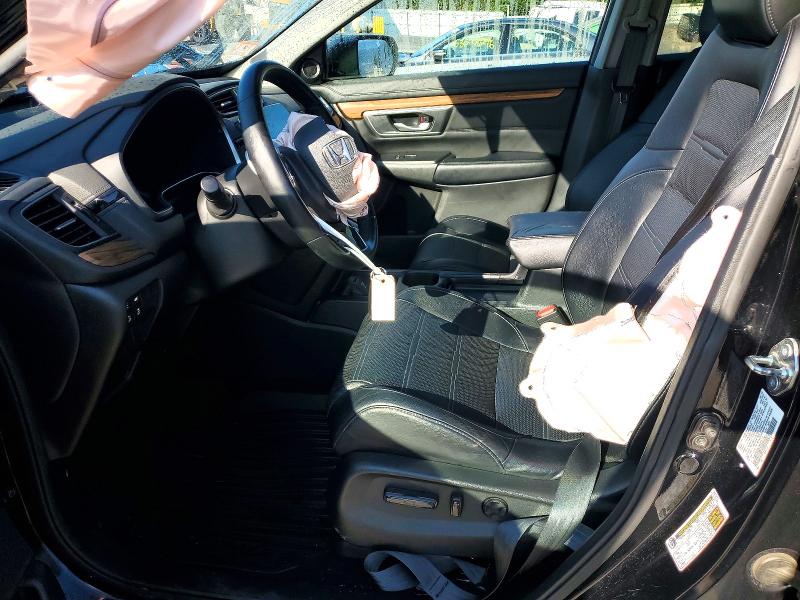 Photo 7 from auction – 2018 HONDA CR-V with VIN 7FARW2H81JE062011