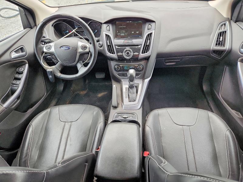Photo 8 from auction – 2014 FORD FOCUS with VIN 1FADP3J25EL297907