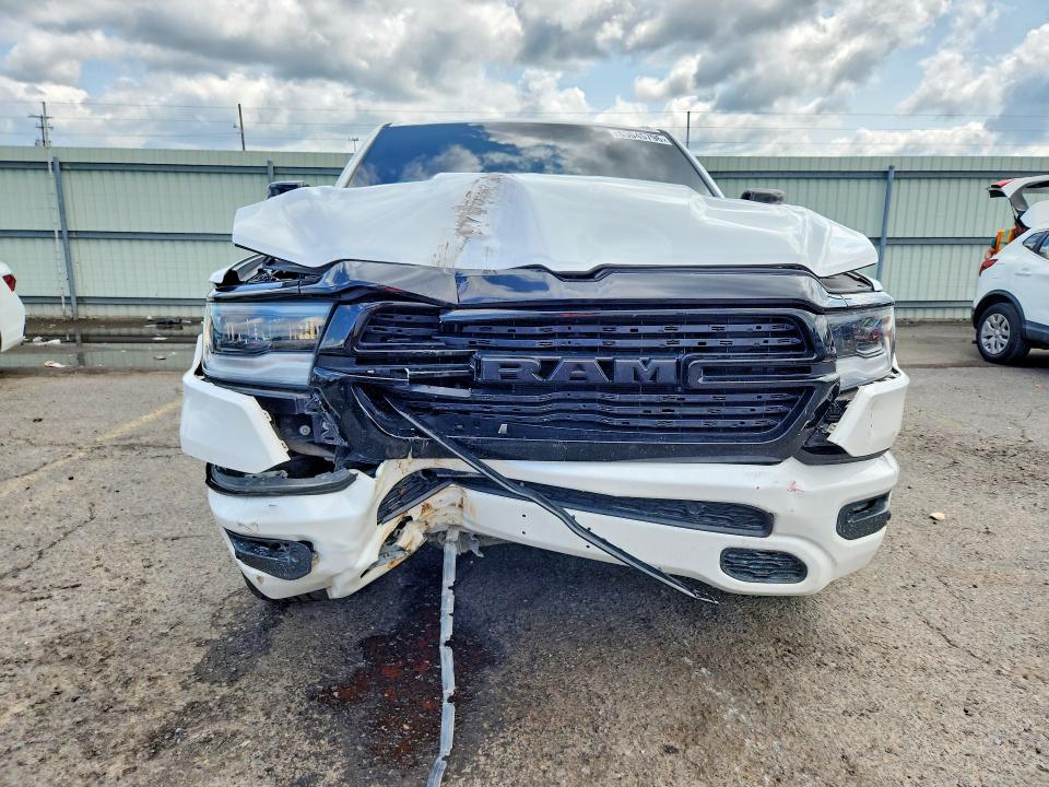 Photo 5 from auction – 2021 RAM 1500 with VIN 1C6SRFRT1MN655119
