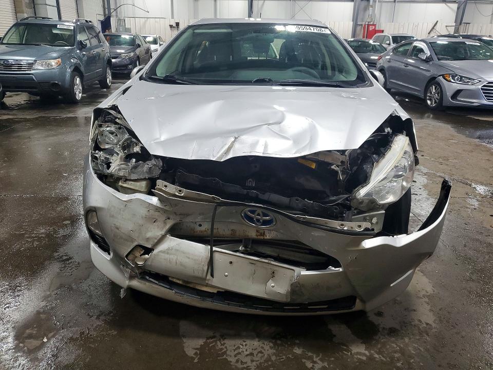 Photo 5 from auction – 2014 TOYOTA PRIUS C with VIN JTDKDTB31E1575196