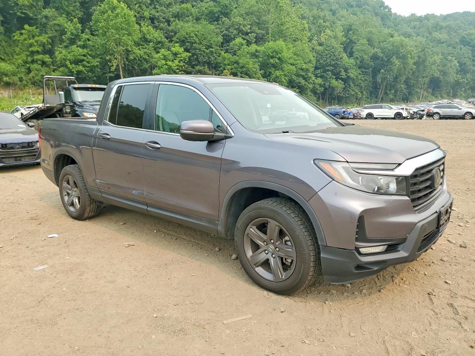 Photo 4 from auction – 2022 HONDA RIDGELINE with VIN 5FPYK3F54NB013089