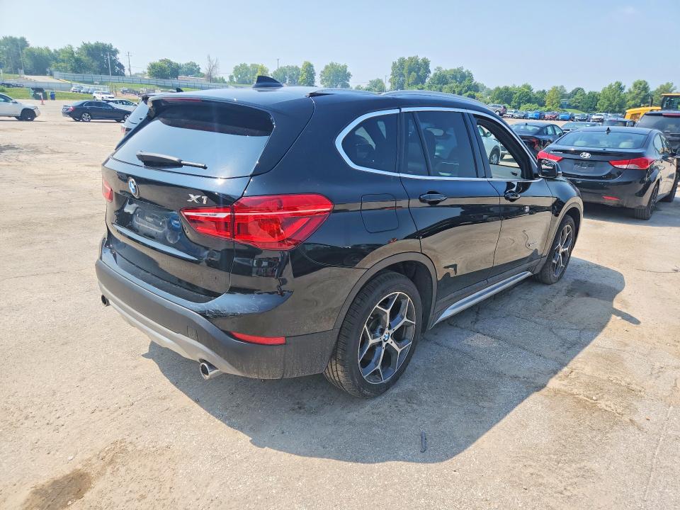 Photo 3 from auction – 2016 BMW X1 with VIN WBXHT3C37G5E50328