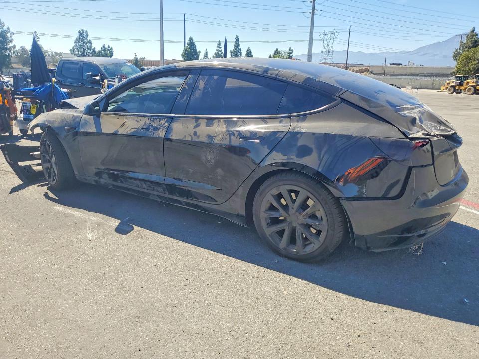 Снимка 2 от търг – 2023 TESLA MODEL 3 с VIN 5YJ3E1EA0PF591335