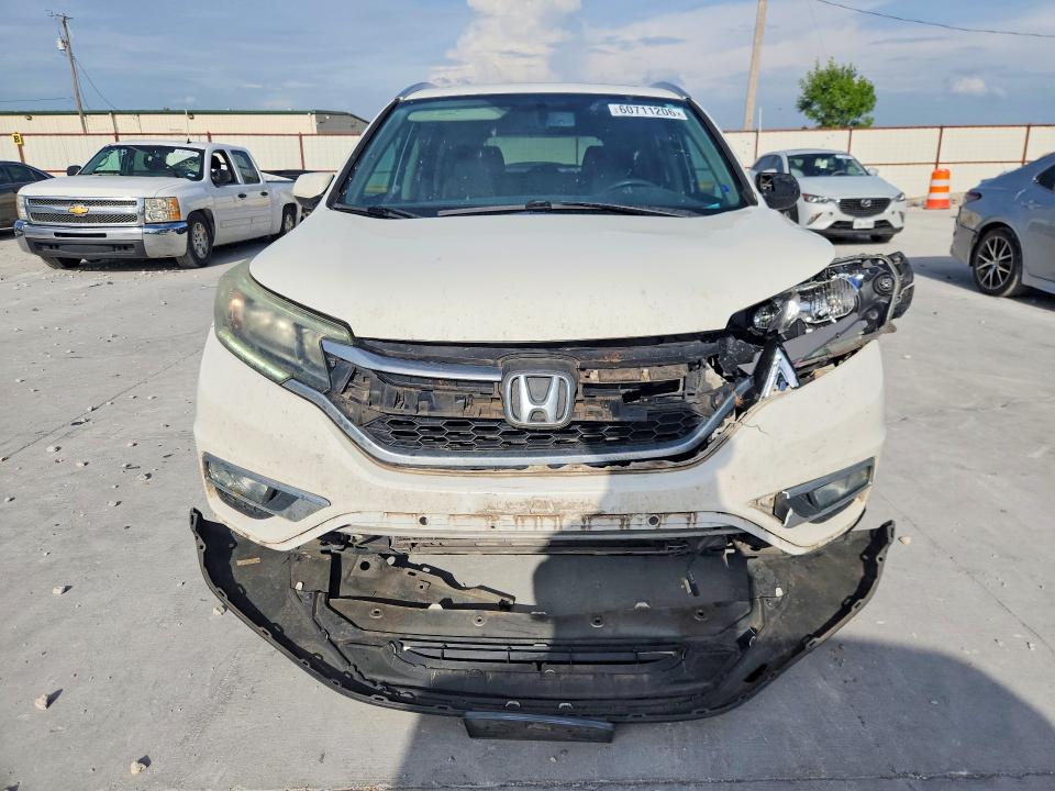 Photo 5 from auction – 2015 HONDA CR-V with VIN 5J6RM3H70FL003223