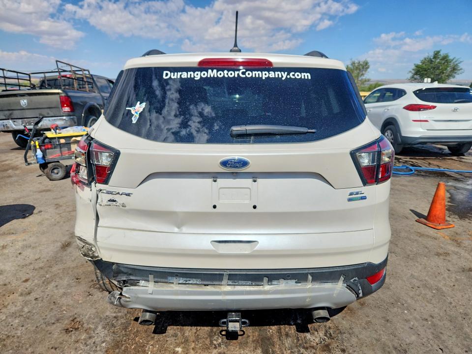 Photo 6 from auction – 2018 FORD ESCAPE with VIN 1FMCU9HD4JUA34803