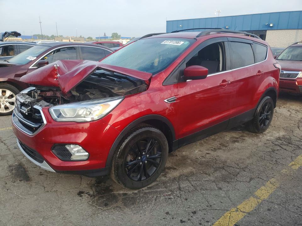 FORD ESCAPE 2017 with VIN 1FMCU9GD2HUC63654 - Photo from auction