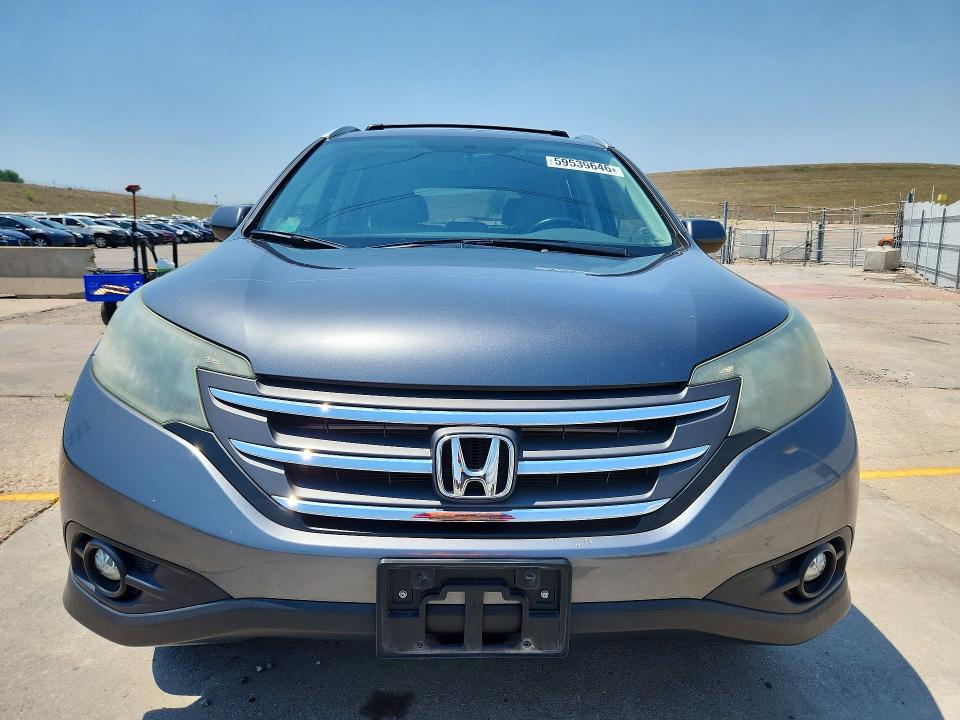 Photo 5 from auction – 2013 HONDA CR-V with VIN 2HKRM4H70DH627357