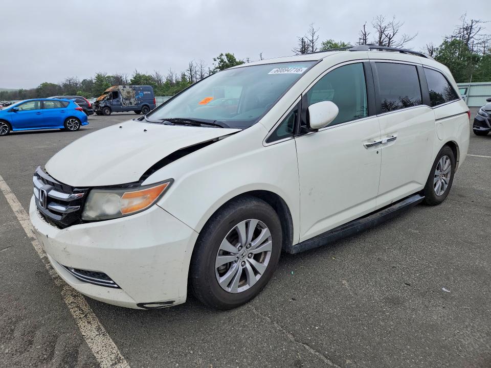 HONDA ODYSSEY 2016 with VIN 5FNRL5H69GB105328 - Photo from auction