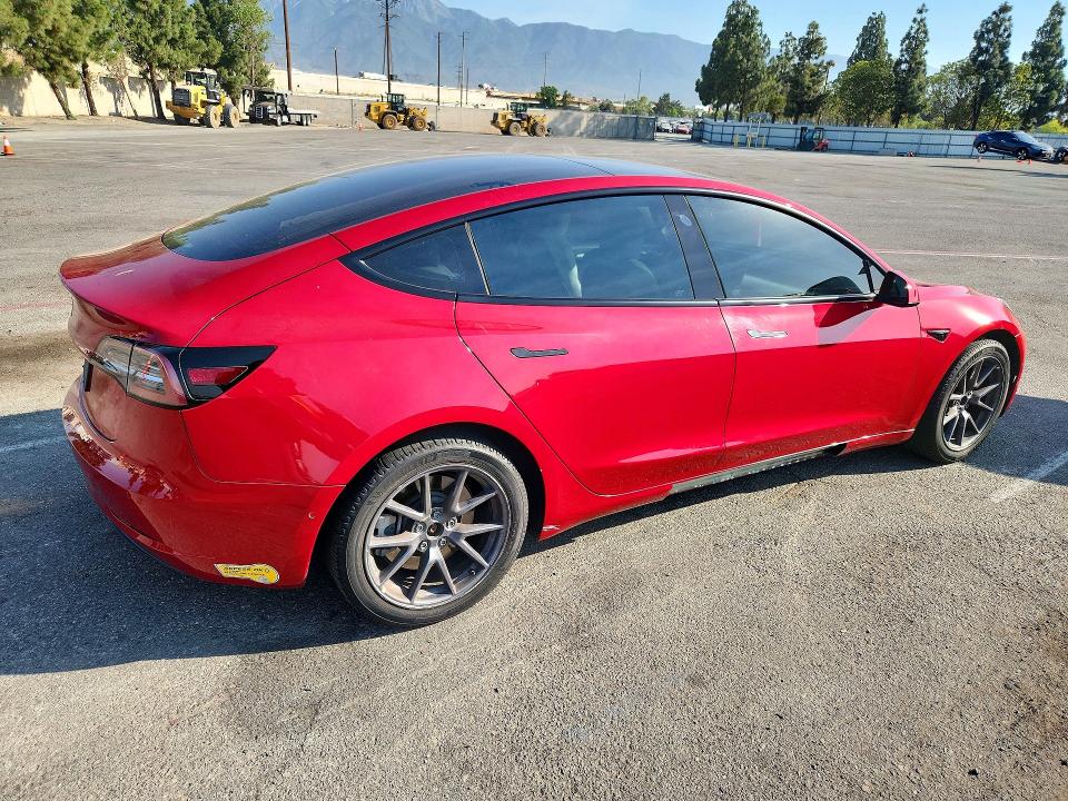 Photo 3 from auction – 2022 TESLA MODEL 3 with VIN 5YJ3E1EA3NF355887