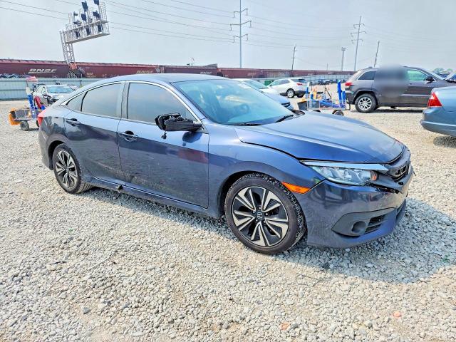 Photo 4 from auction – 2018 HONDA CIVIC with VIN JHMFC1F74JX028256