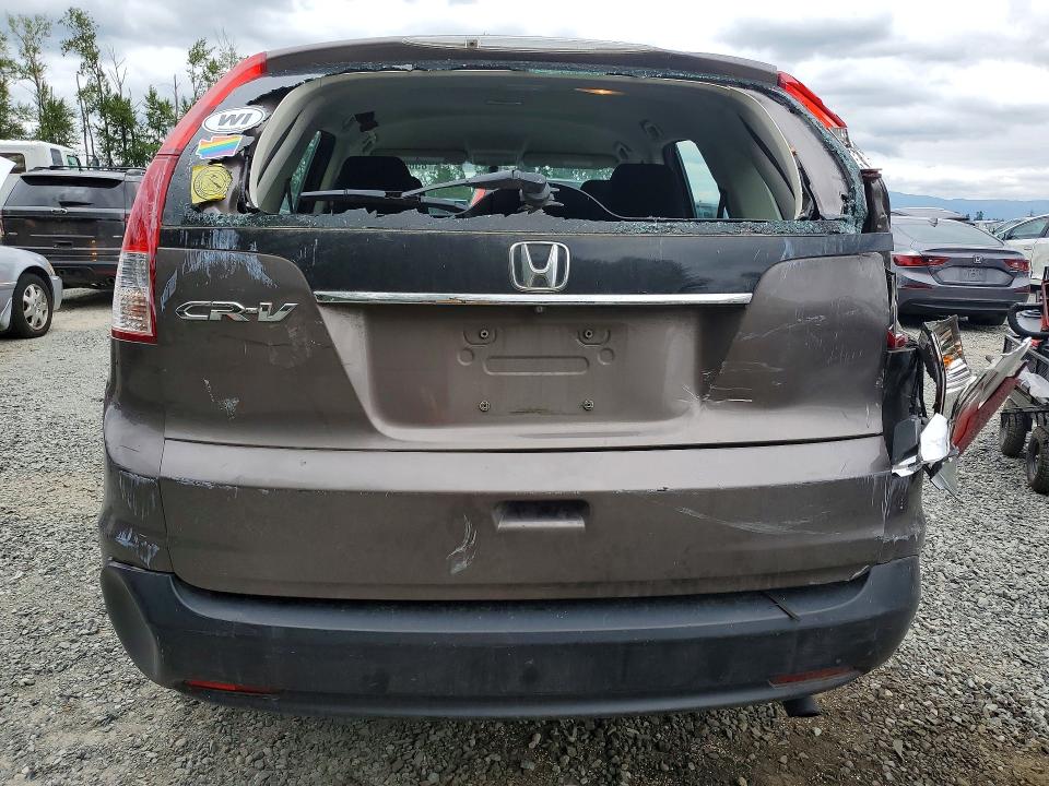 Photo 6 from auction – 2013 HONDA CR-V with VIN 3CZRM3H36DG709152