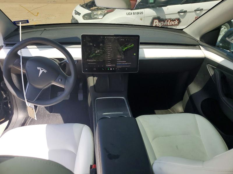 Photo 8 from auction – 2023 TESLA MODEL Y with VIN 7SAYGAEE1PF853336
