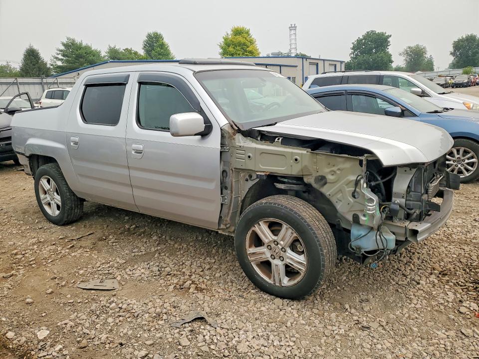 Photo 4 from auction – 2010 HONDA RIDGELINE with VIN 5FPYK1F57AB002280