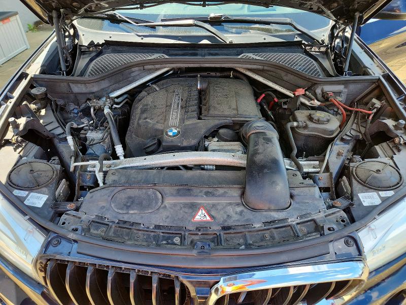 Photo 12 from auction – 2014 BMW X5 with VIN 5UXKR0C5XE0K47361