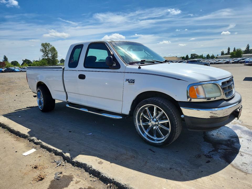 Photo 4 from auction – 2002 FORD F150 with VIN 1FTRX17WX2NB18789