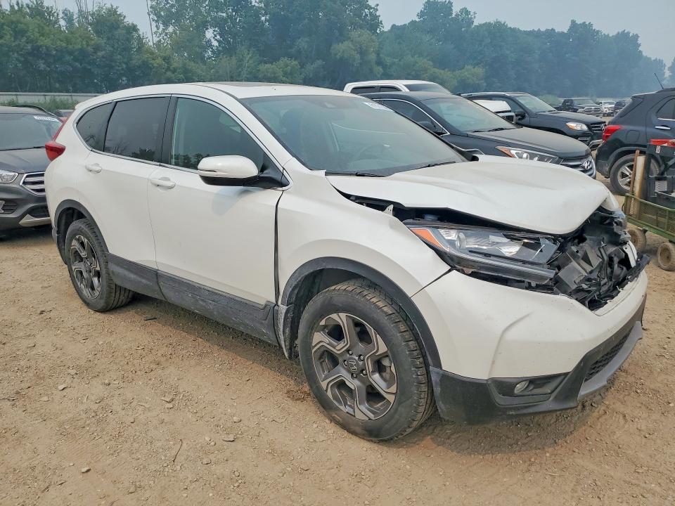 Photo 4 from auction – 2019 HONDA CR-V with VIN 2HKRW2H54KH663272