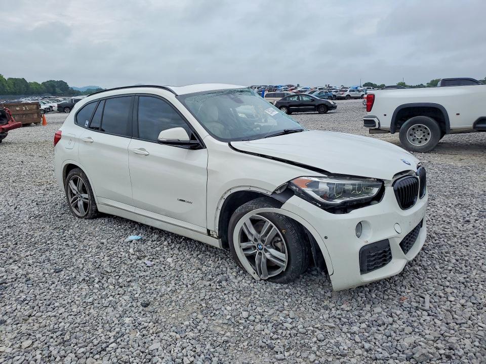 Photo 4 from auction – 2017 BMW X1 with VIN WBXHU7C36H5H36418