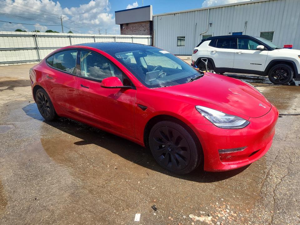 Photo 4 from auction – 2022 TESLA MODEL 3 with VIN 5YJ3E1EA4NF298342