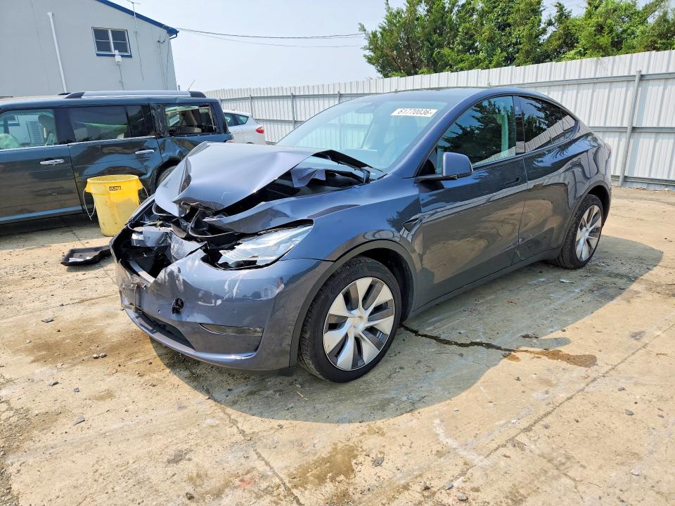 TESLA MODEL Y 2022 with VIN 7SAYGDEE1NA016940 - Photo from auction