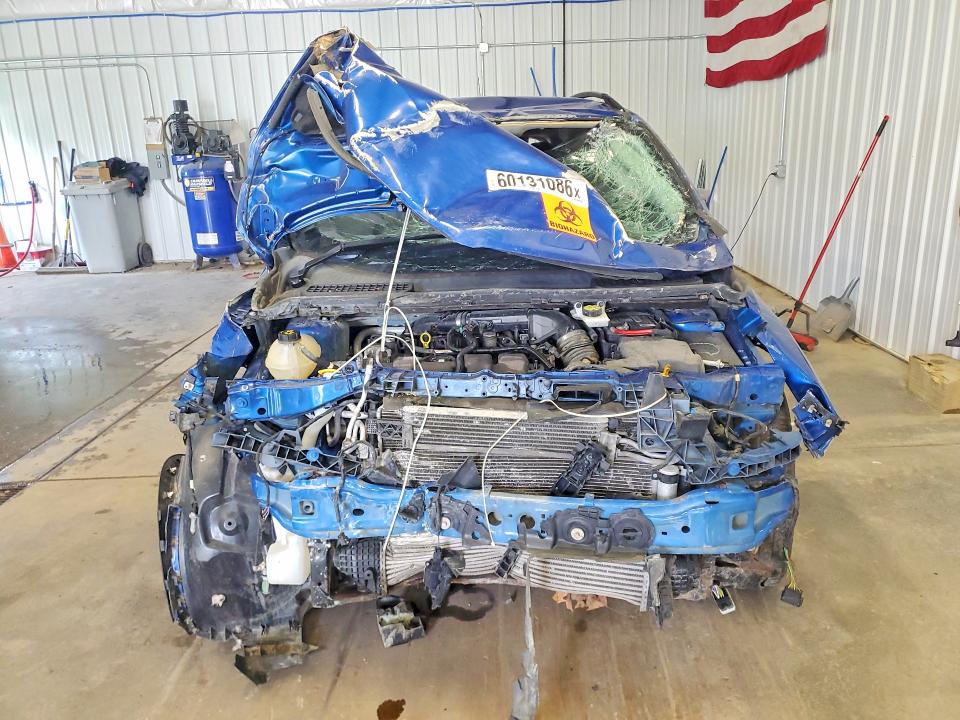 Photo 5 from auction – 2017 FORD ESCAPE with VIN 1FMCU9G96HUD06503