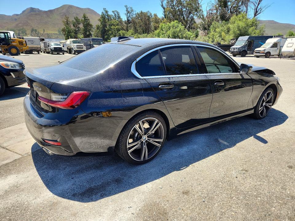 Photo 3 from auction – 2021 BMW 330E with VIN 3MW5P7J0XM8C14589