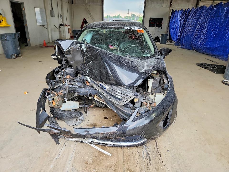 Photo 5 from auction – 2011 FORD FIESTA with VIN 3FADP4CJ7BM206947
