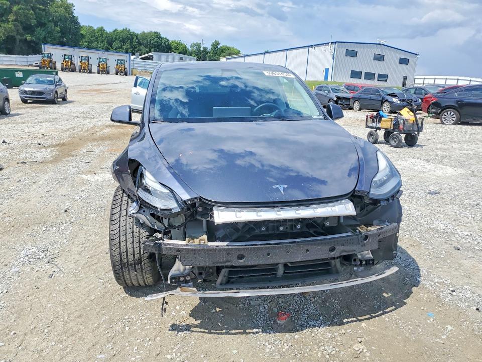 Photo 5 from auction – 2022 TESLA MODEL Y with VIN 7SAYGAEEXNF422300