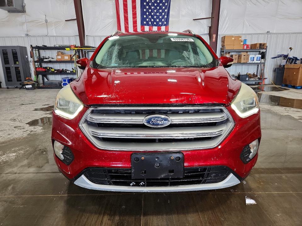 Photo 5 from auction – 2017 FORD ESCAPE with VIN 1FMCU9J96HUD56536