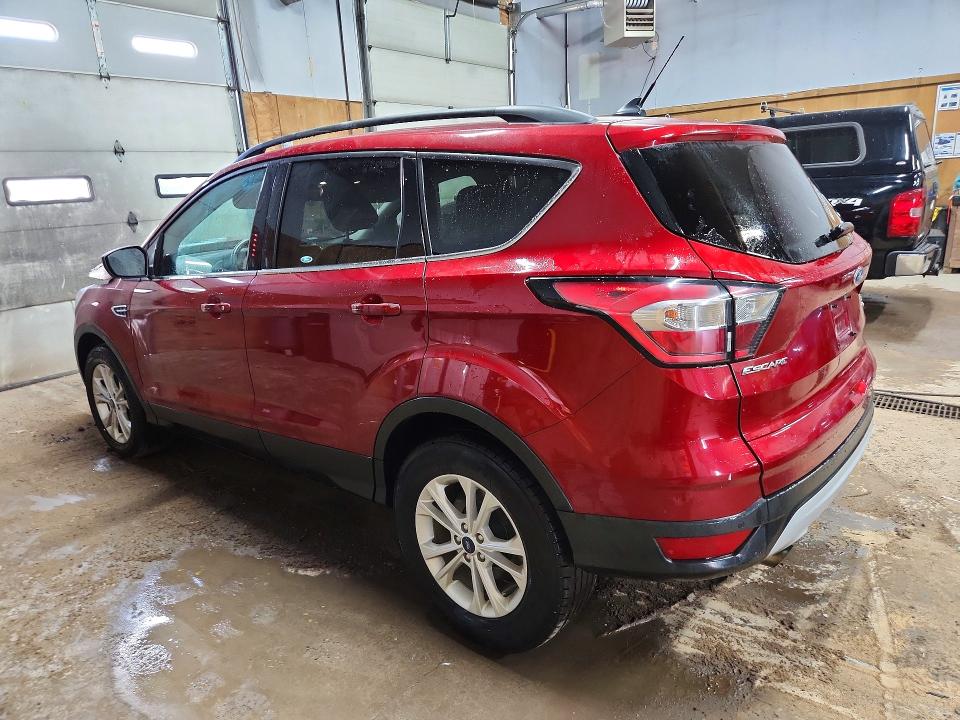 Photo 2 from auction – 2018 FORD ESCAPE with VIN 1FMCU9HD2JUC04821