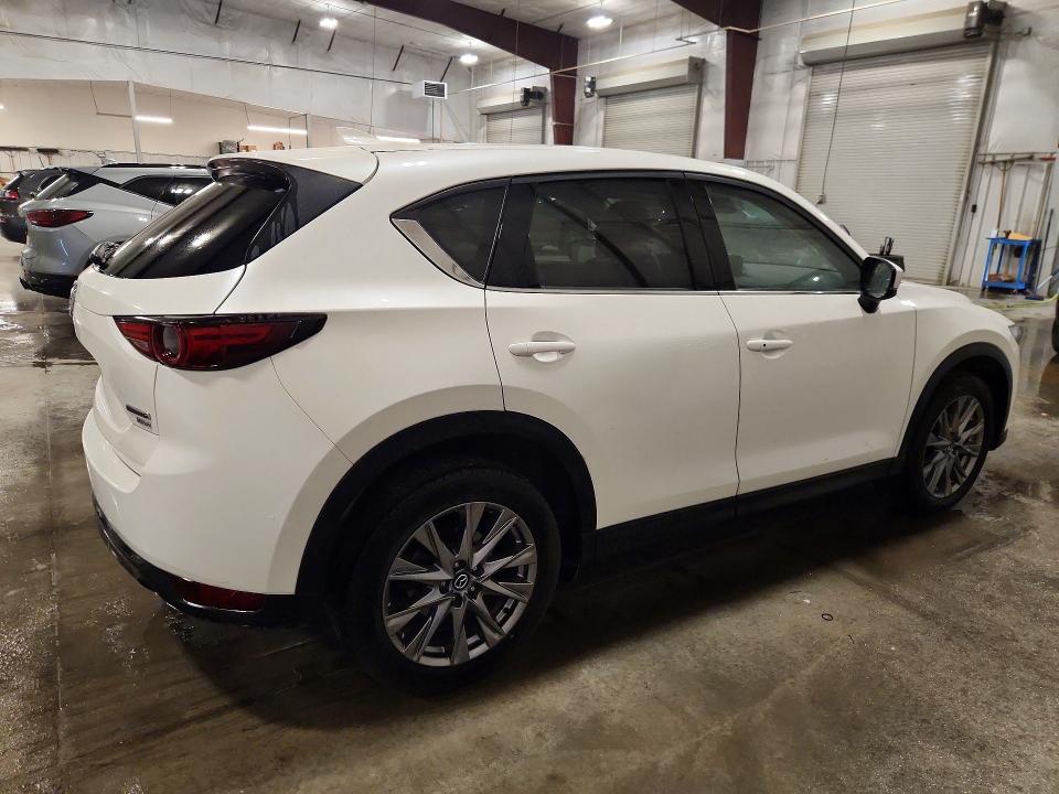 Photo 3 from auction – 2021 MAZDA CX-5 with VIN JM3KFBAY9M0312001
