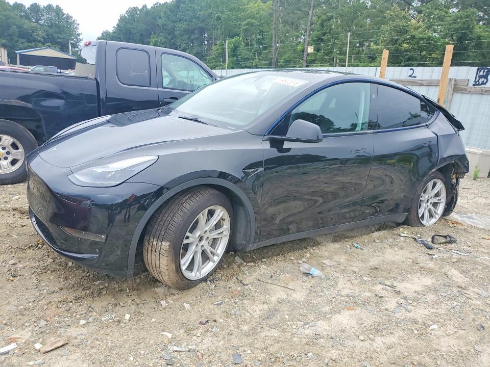 TESLA MODEL Y 2023 with VIN 7SAYGAEE4PF806589 - Photo from auction