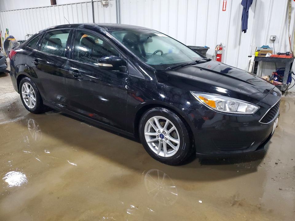 Photo 4 from auction – 2016 FORD FOCUS with VIN 1FADP3F29GL274657