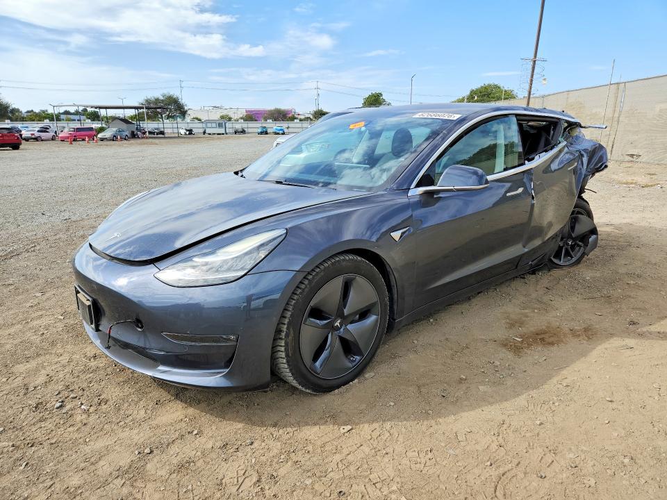 TESLA MODEL 3 2017 with VIN 5YJ3E1EA5HF001261 - Photo from auction