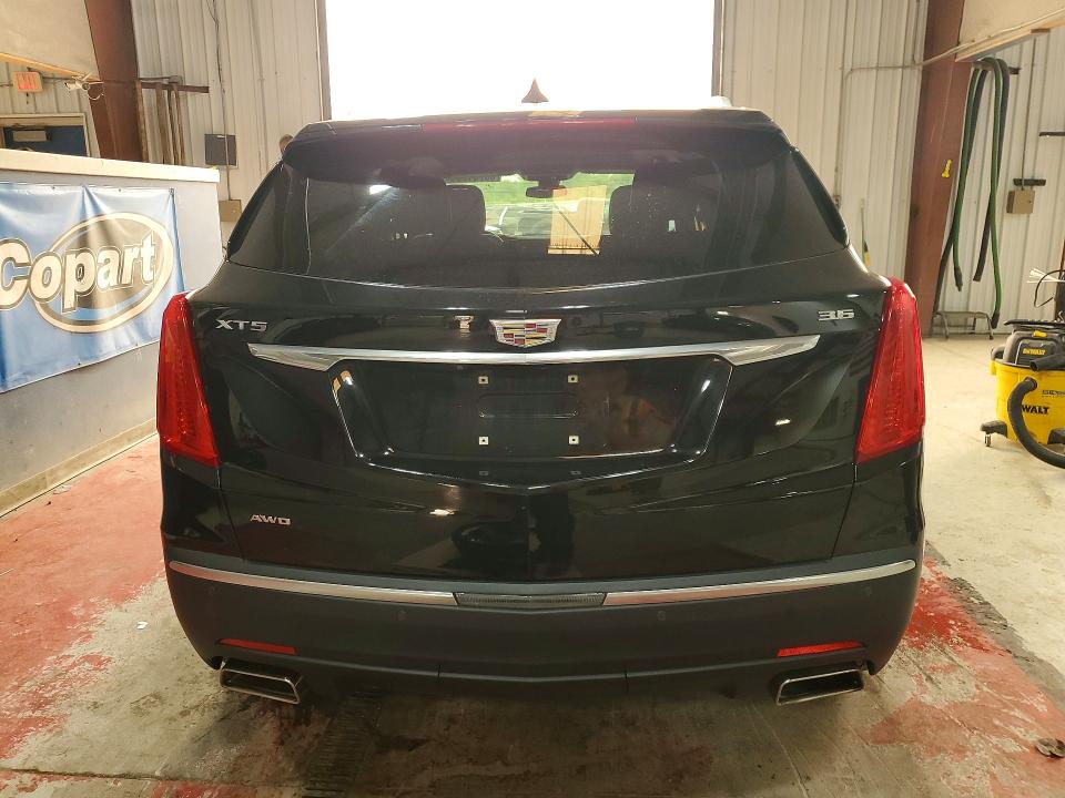 Photo 6 from auction – 2018 CADILLAC XT5 with VIN 1GYKNDRS8JZ121081