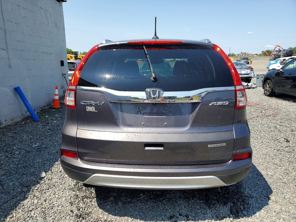 Photo 6 from auction – 2015 HONDA CR-V with VIN 5J6RM4H90FL065955