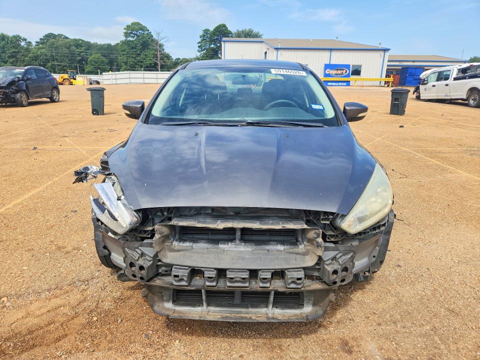 Photo 5 from auction – 2015 FORD FOCUS with VIN 1FADP3F20FL268793