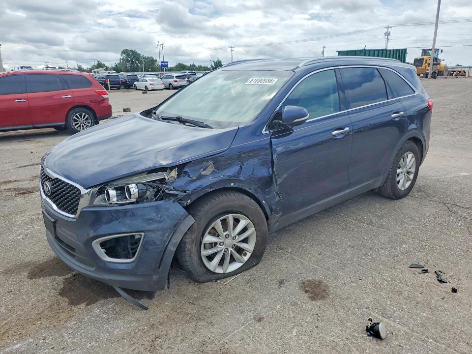 KIA SORENTO 2017 with VIN 5XYPG4A56HG210040 - Photo from auction