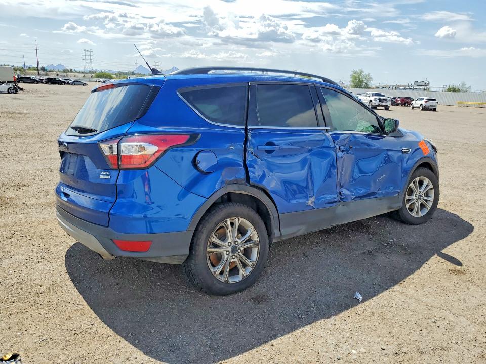 Photo 3 from auction – 2018 FORD ESCAPE with VIN 1FMCU0HD2JUD30852