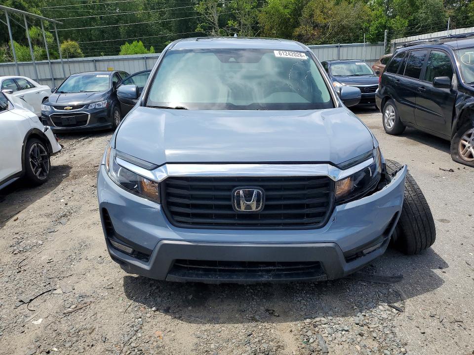 Photo 5 from auction – 2023 HONDA RIDGELINE with VIN 5FPYK3F53PB007724