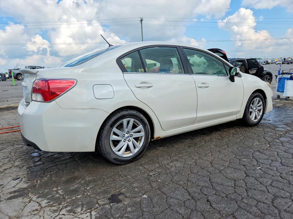 Photo 3 from auction – 2016 SUBARU IMPREZA with VIN JF1GJAB6XGH013858