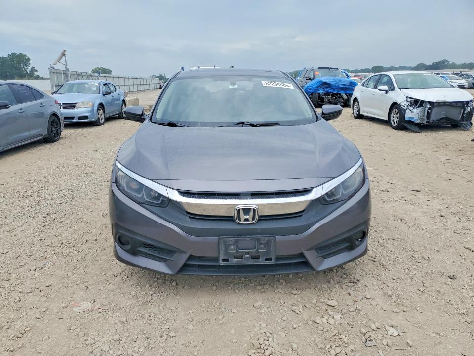 Photo 5 from auction – 2016 HONDA CIVIC with VIN 19XFC1F35GE012106