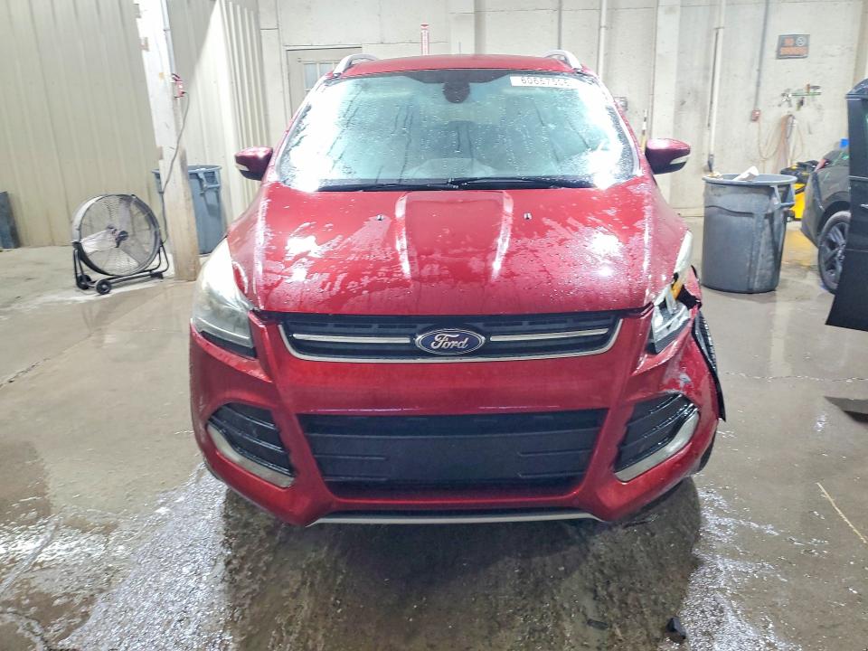 Photo 5 from auction – 2014 FORD ESCAPE with VIN 1FMCU0J97EUB83584